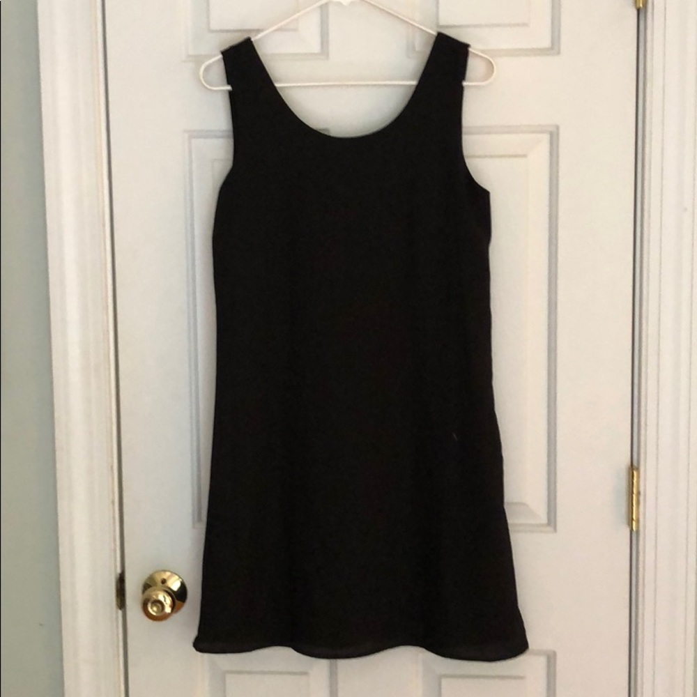 Black dress with red bow on back